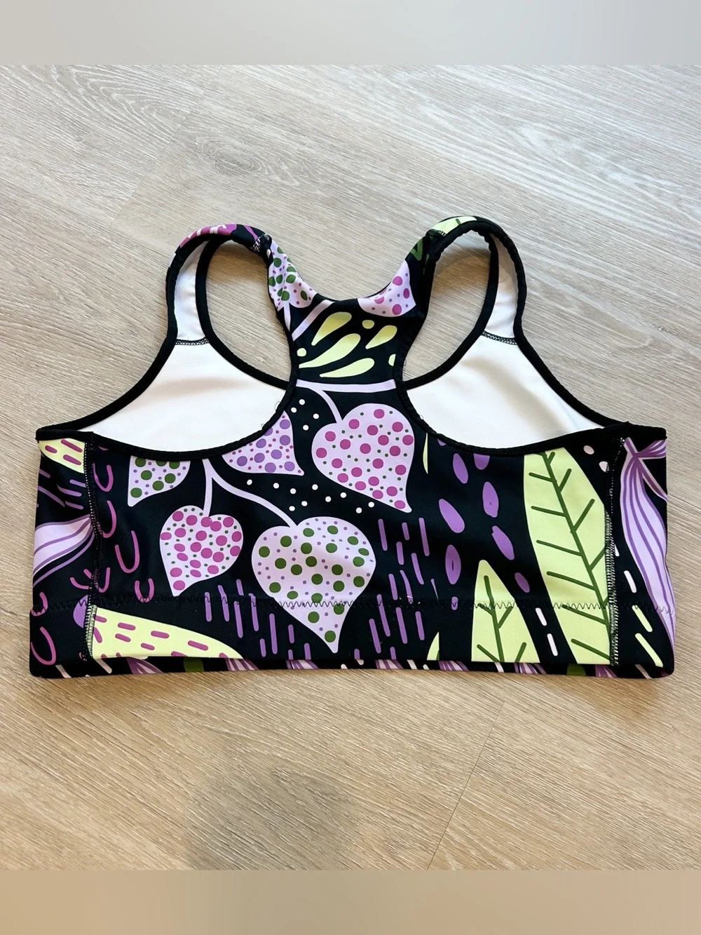 Loony Legs sports bra with purple/green leaf design size XL